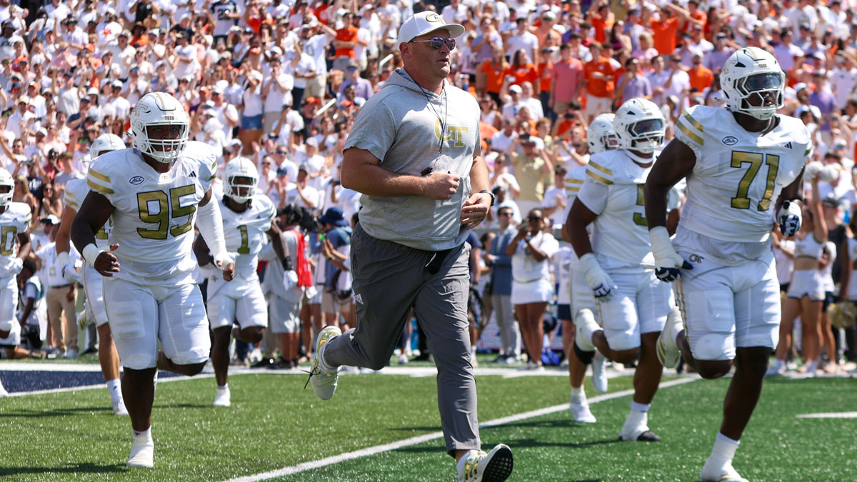 Georgia Tech Yellow Jackets head coach Brent Key runs on the field before a game against the Clemson Tigers at Bobby Dodd Stadium at Hyundai Field.