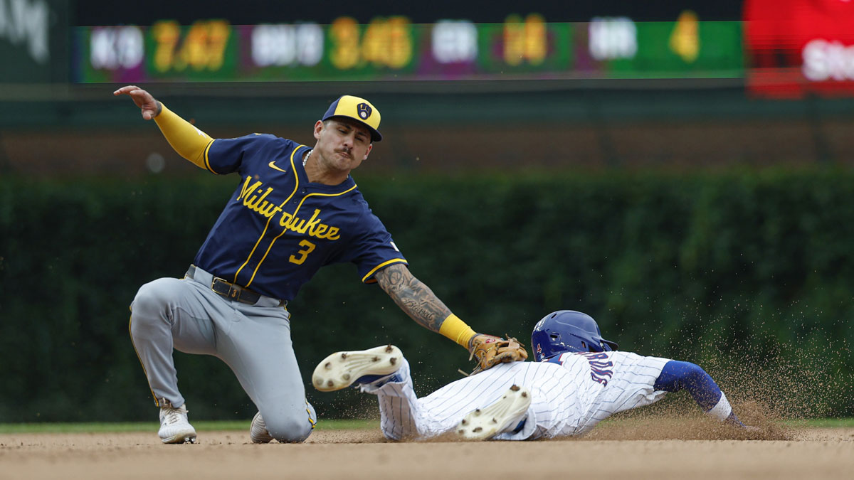 Milwaukee Brewers shortstop Joey Ortiz (3) tags out Chicago Cubs center fielder Pete Crow-Armstrong (4) at second base during the eight inning of the game one of the doubleheader at Wrigley Field.