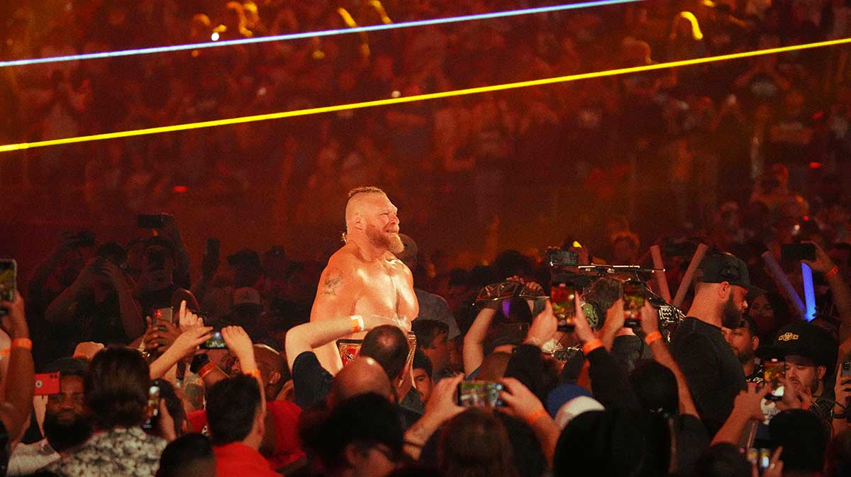 Brock Lesnar, who will face WWE star John Cena at Wrestlepalooza, which ESPN commentator Chris Fowler promoted.