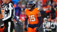 Denver Broncos linebacker Nik Bonitto (15) celebrates his sack in the second half against the Atlanta Falcons at Empower Field at Mile High.