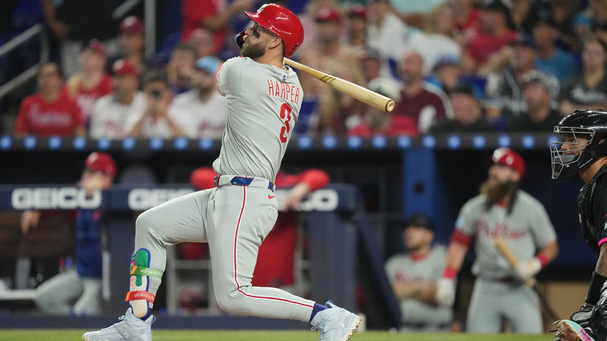 Sep 6, 2025; Miami, Florida, USA; Philadelphia Phillies first baseman Bryce Harper (3) hits a two-run home run in the first inning against the Miami Marlins at loanDepot Park.