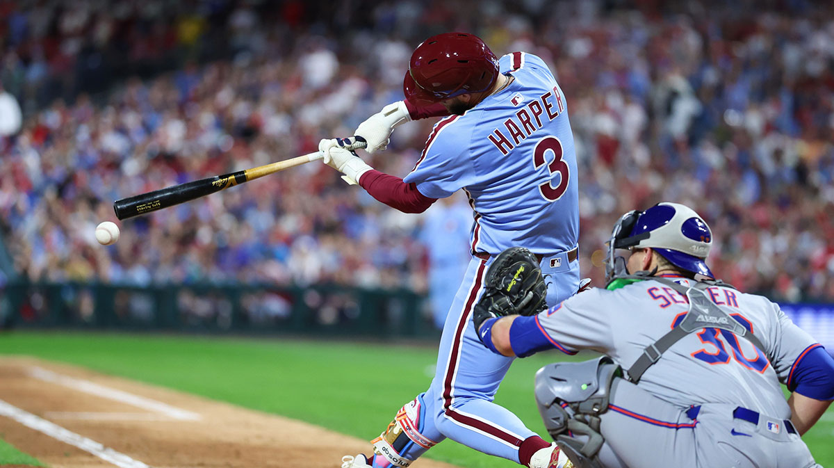 Philadelphia Phillies first base Bryce Harper (3) hits an RBI single against the New York Mets during the sixth inning at Citizens Bank Park.