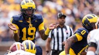 Michigan quarterback Bryce Underwood (19) calls for the ball against Central Michigan during the second half at Michigan Stadium