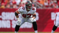 Tampa Bay Buccaneers offensive tackle Luke Goedeke (67) lines up against the Washington Commanders in the first quarter at Raymond James Stadium.