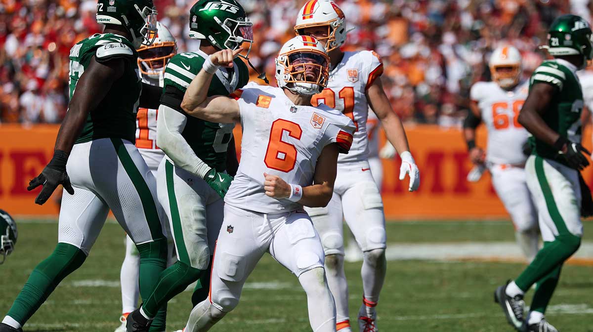 Sep 21, 2025; Tampa, Florida, USA; Tampa Bay Buccaneers quarterback Baker Mayfield (6) reacts after a run against the New York Jets in the fourth quarter at Raymond James Stadium. Mandatory Credit: Nathan Ray Seebeck-Imagn Images
