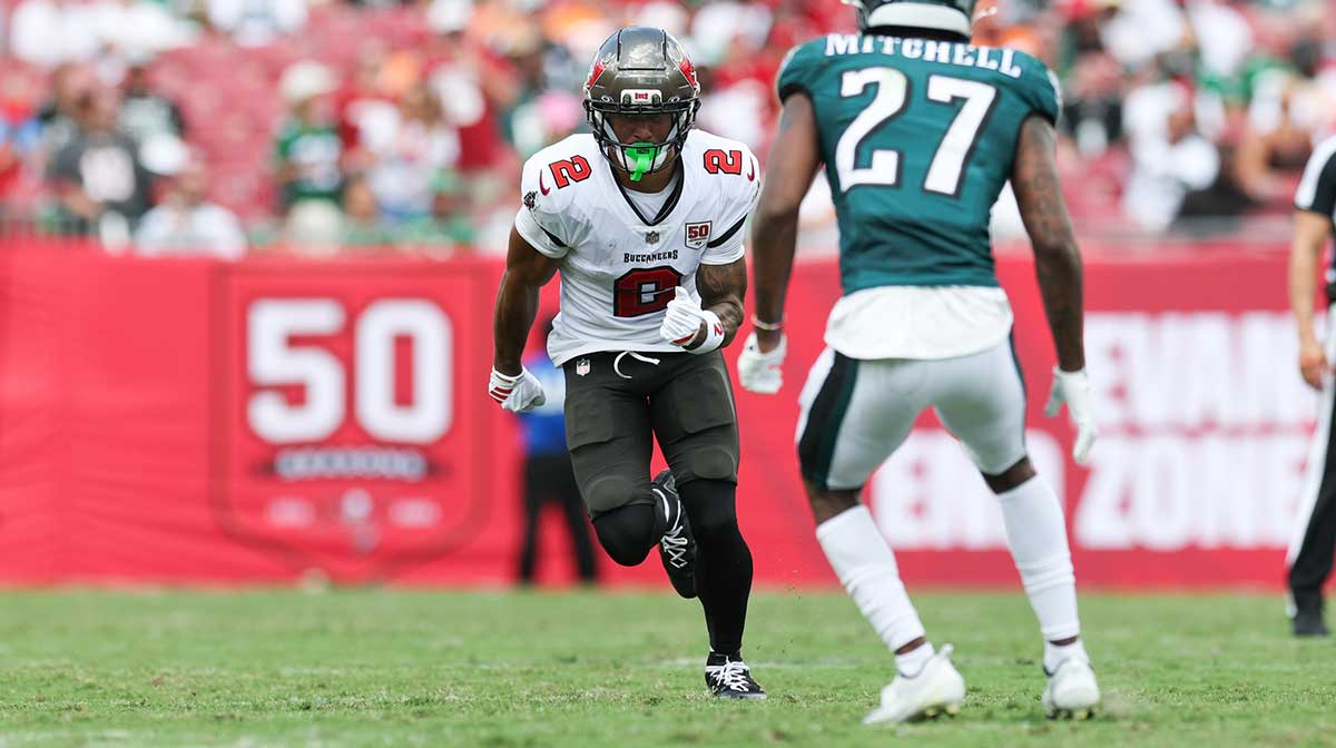 Tampa Bay Buccaneers wide receiver Emeka Egbuka (2) runs against Philadelphia Eagles cornerback Quinyon Mitchell (27) during the third quarter at Raymond James Stadium.
