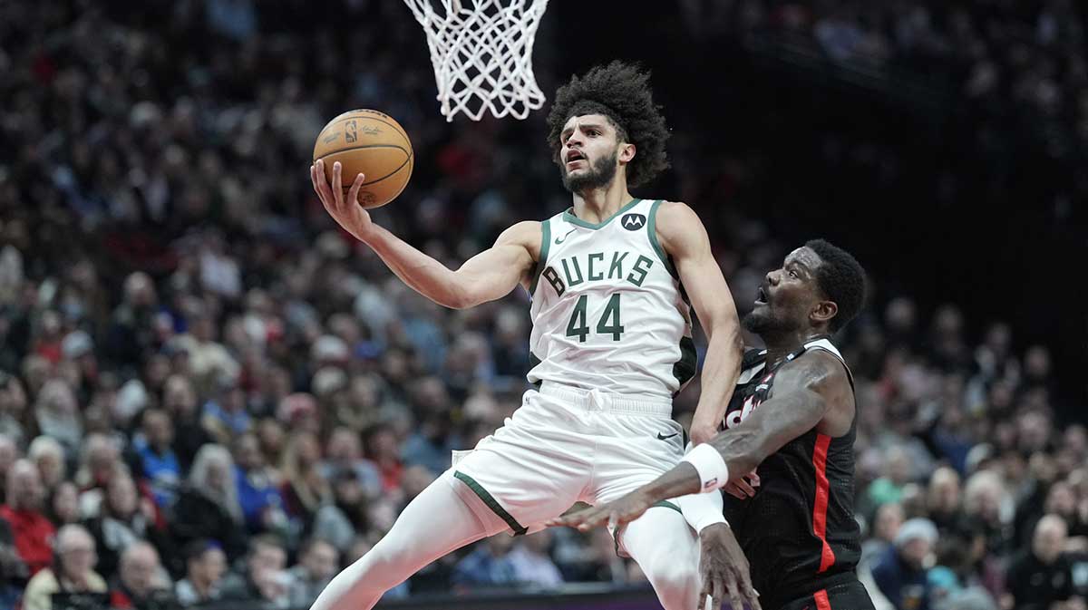 Milwaukee Bucks guard Andre Jackson Jr. (44) shoots the ball against Portland Trail Blazers center Deandre Ayton (2) during the second half at Moda Center.