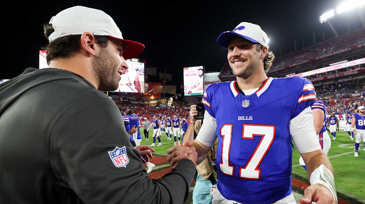 Buffalo Bills quarterback Josh Allen (17) greets Tampa Bay Buccaneers quarterback Baker Mayfield (6) after a preseason game at Raymond James Stadium.