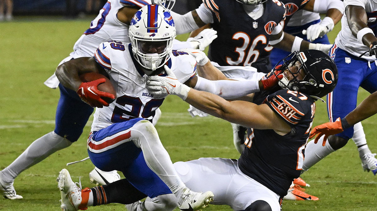 Buffalo Bills cornerback Brandon Codrington (29) runs the ball against Chicago Bears linebacker Swayze Bozeman (27) during the second half at Soldier Field.
