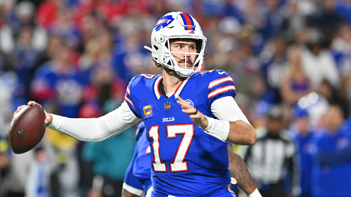 Buffalo Bills quarterback Josh Allen (17) passes the ball against the Baltimore Ravens during the first half at Highmark Stadium.