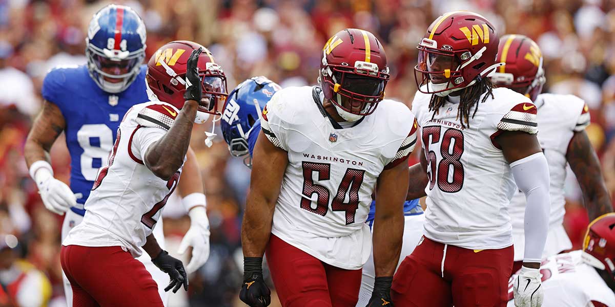 Washington Commanders linebacker Bobby Wagner (54) celebrates after a play during the second quarter against the New York Giants at Northwest Stadium.
