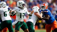 South Florida Bulls quarterback Byrum Brown (17) looks to throw against the Florida Gators during the first half at Ben Hill Griffin Stadium. Mandatory Credit: Matt Pendleton-Imagn Images