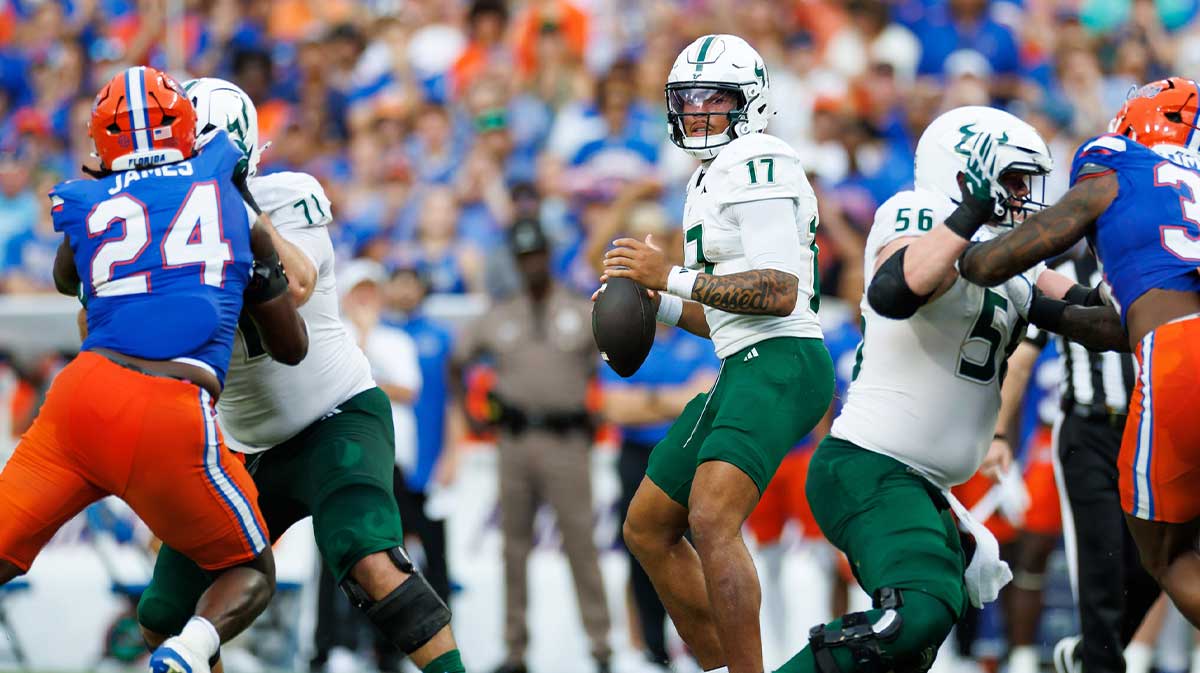 South Florida Bulls quarterback Byrum Brown (17) looks to throw against the Florida Gators during the first half at Ben Hill Griffin Stadium.
