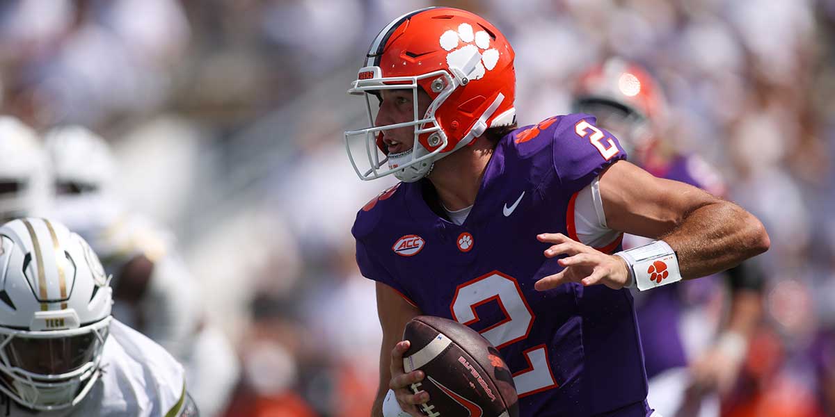 Clemson Tigers quarterback Cade Klubnik (2) scrambles against the Georgia Tech Yellow Jackets in the second quarter at Bobby Dodd Stadium at Hyundai Field.
