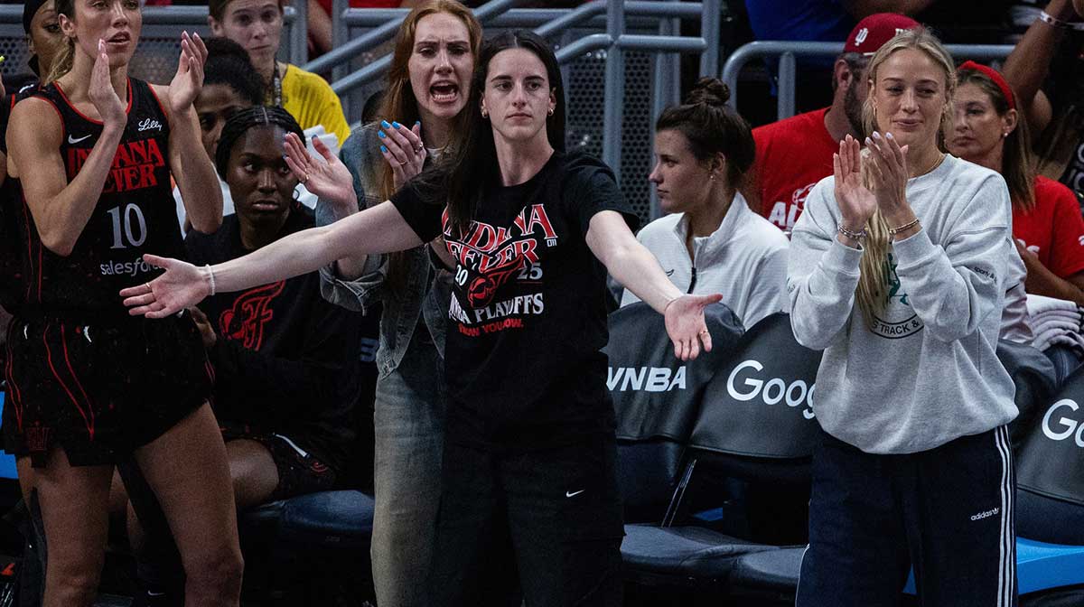 Indiana Fever teammates Caitlin Clark and Sophie Cunningham during the team's playoff game against the Atlanta Dream.
