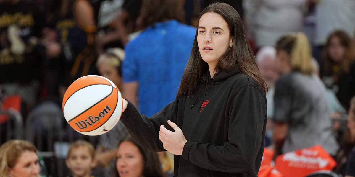 Indiana Fever guard Caitlin Clark (22) walks out on to the floor before a game against the Phoenix Mercury at PHX Arena.