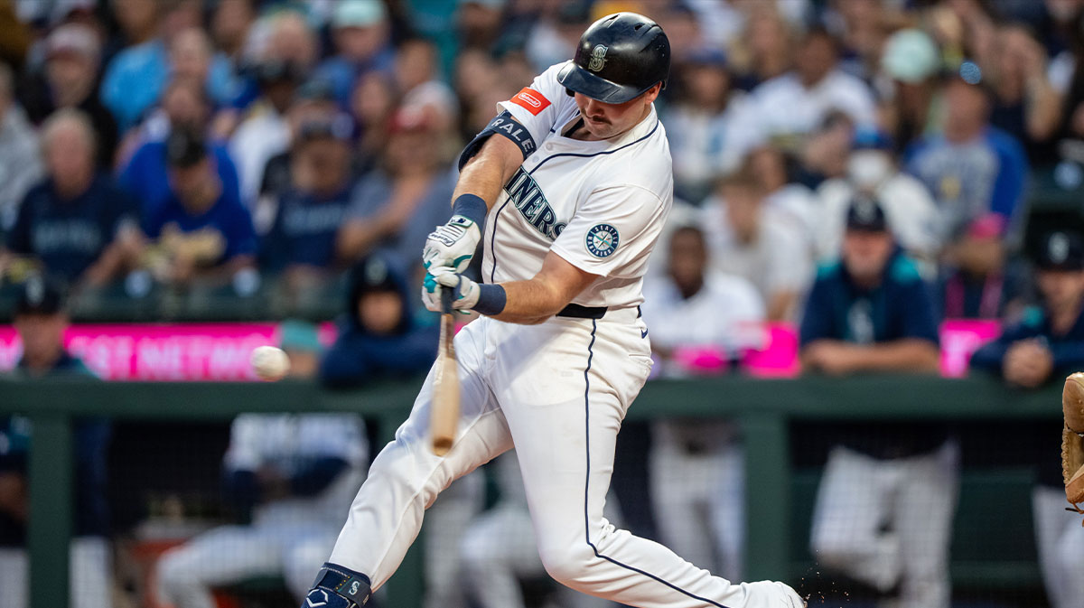 Seattle Mariners catcher Cal Raleigh (29) hits a solo home run during the first inning against the Colorado Rockies at T-Mobile Park.