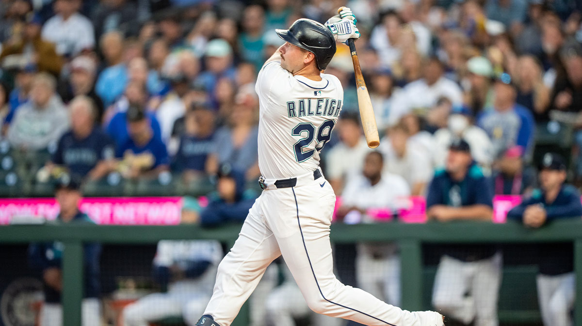 Seattle Mariners catcher Cal Raleigh (29) hits a solo home run during the first inning against the Colorado Rockies at T-Mobile Park.