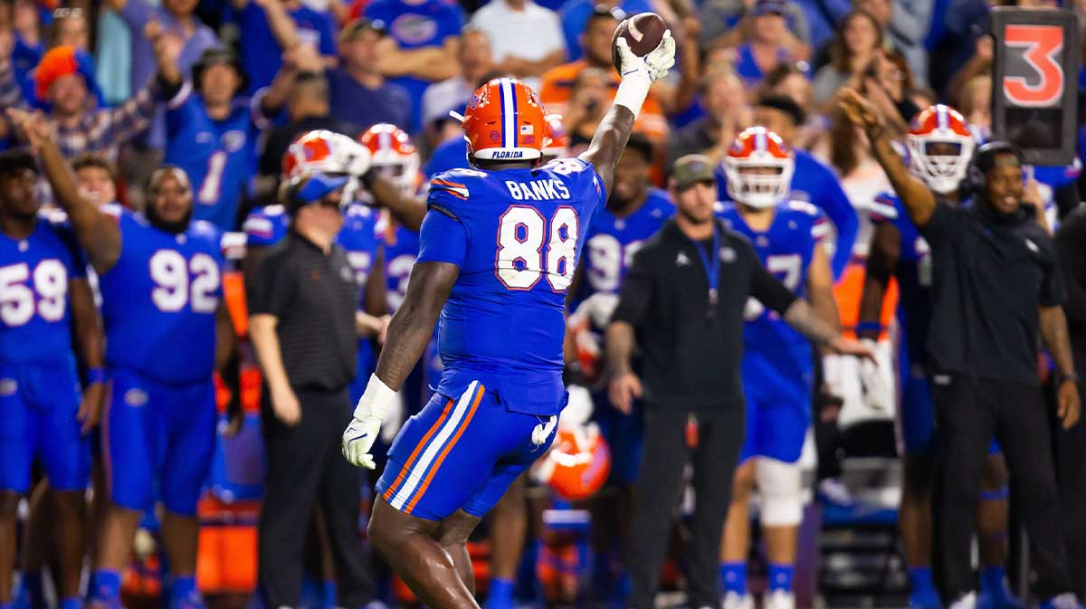 Florida Gators defensive lineman Caleb Banks (88) comes up the fumble during the second half at Ben Hill Griffin Stadium in Gainesville, FL on Saturday, November 16, 2024. The Gators defeated the Tigers 27-16.