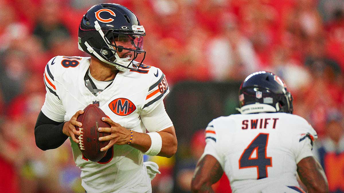 Chicago Bears quarterback Caleb Williams (18) drops back to pass during the first half against the Kansas City Chiefs at GEHA Field at Arrowhead Stadium.