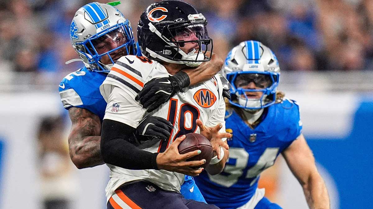 Detroit Lions safety Brian Branch (32) sacks Chicago Bears quarterback Caleb Williams (18) during the second half at Ford Field in Detroit on Sunday, Sept. 14, 2025.