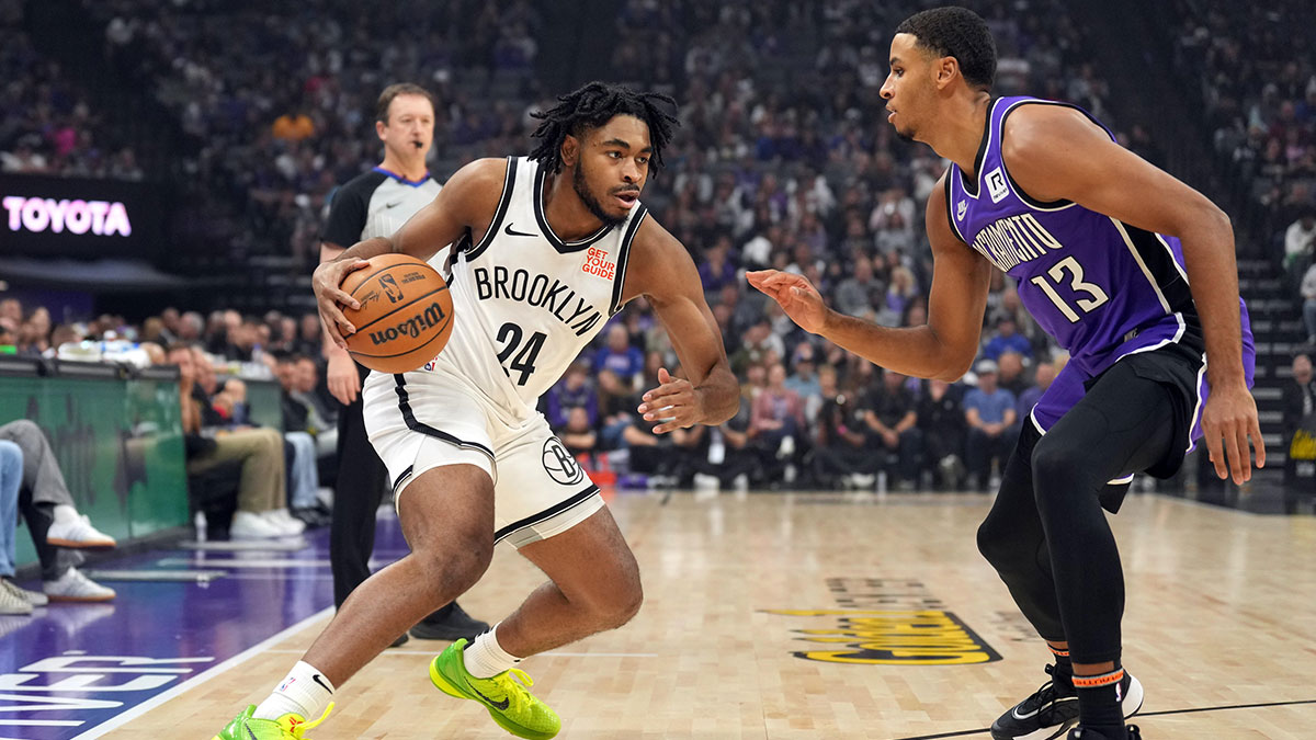 Brooklyn Nets guard Cam Thomas (24) dribbles against Sacramento Kings forward Keegan Murray (13) during the first quarter at Golden 1 Center.