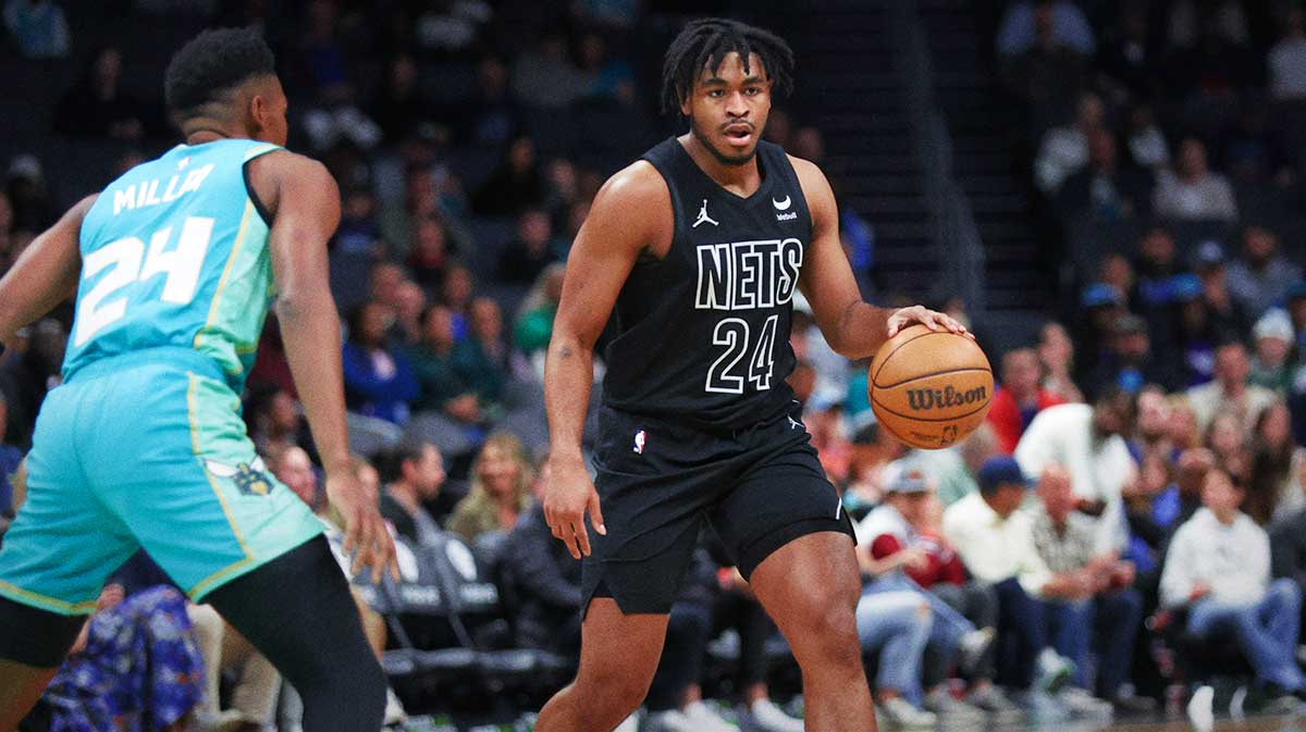 Brooklyn Nets guard Cam Thomas (24) sets the play against the Charlotte Hornets during the first quarter at Spectrum Center.