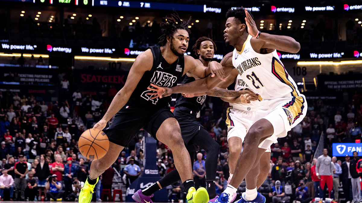 Brooklyn Nets guard Cam Thomas (24) dribbles against New Orleans Pelicans center Yves Missi (21) during the first half at Smoothie King Center.