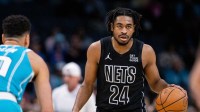 Mar 8, 2025; Charlotte, North Carolina, USA; Brooklyn Nets guard Cam Thomas (24) brings the ball up court against the Charlotte Hornets during the first quarter at Spectrum Center. Mandatory Credit: Scott Kinser-Imagn Images
