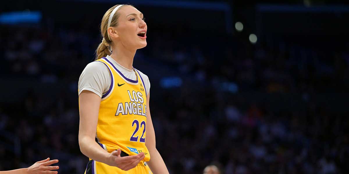 Los Angeles Sparks forward Cameron Brink (22) reacts after she was called for a foul on Las Vegas Aces center A'ja Wilson (22) during the first half at Crypto.com Arena.