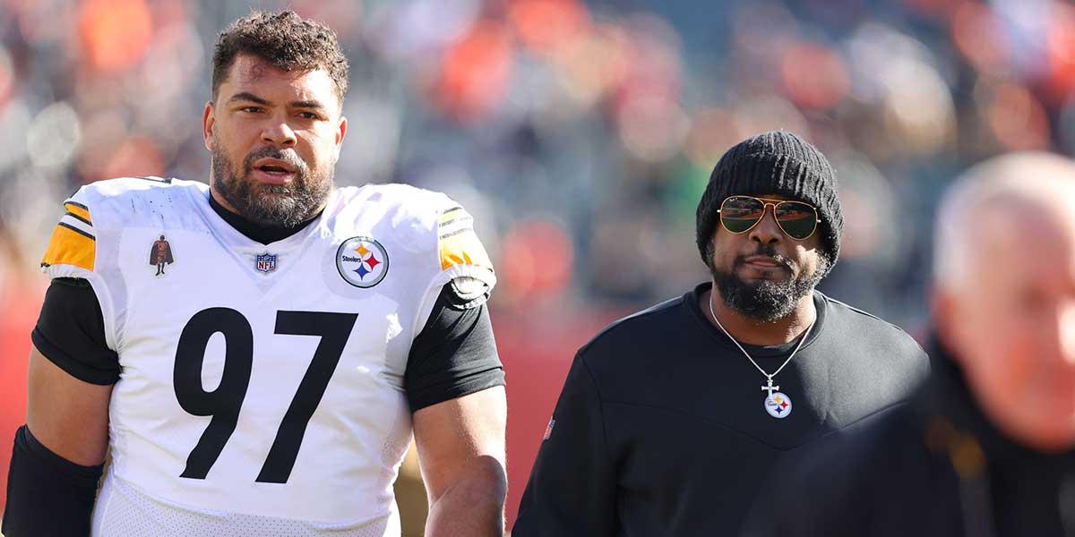 Pittsburgh Steelers defensive tackle Cameron Heyward (97) and head coach Mike Tomlin before the game against the Cincinnati Bengals at Paycor Stadium.