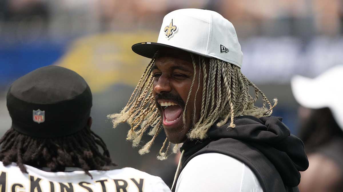 New Orleans Saints defensive end Cameron Jordan (94) talks with cornerback Kool-Aid McKinstry (4) against the Los Angeles Chargers in the first half at SoFi Stadium.