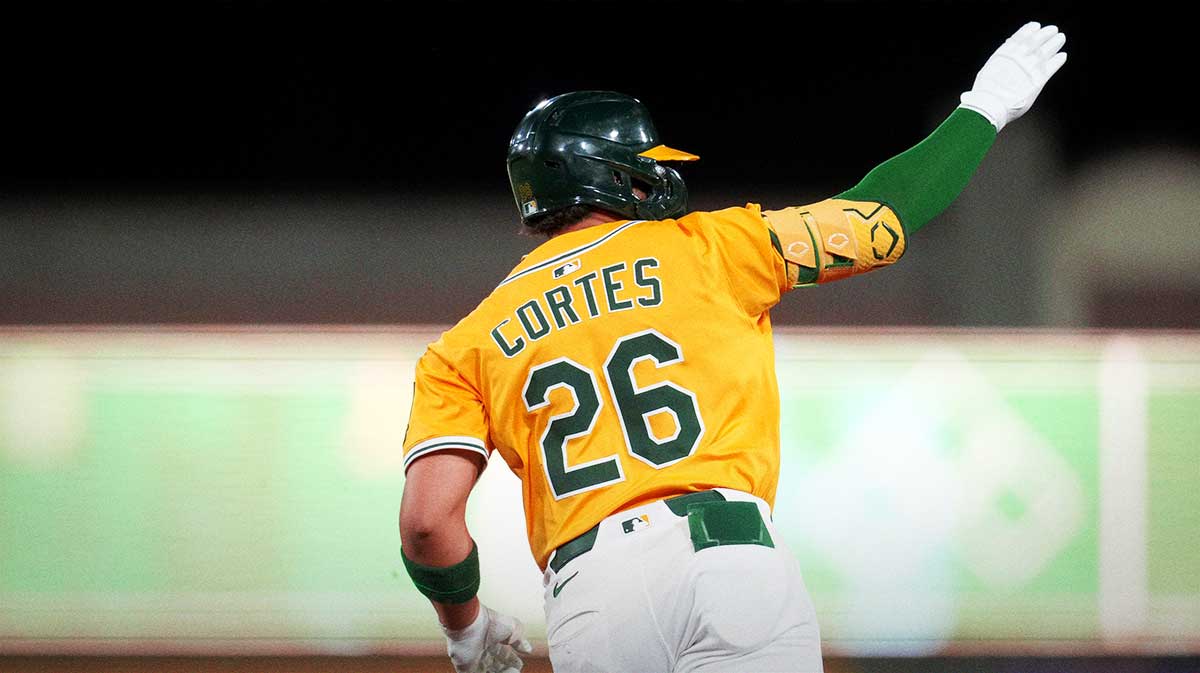Athletics left fielder Carlos Cortes (26) reacts after hitting a home run against the Cincinnati Reds in the third inning at Sutter Health Park.