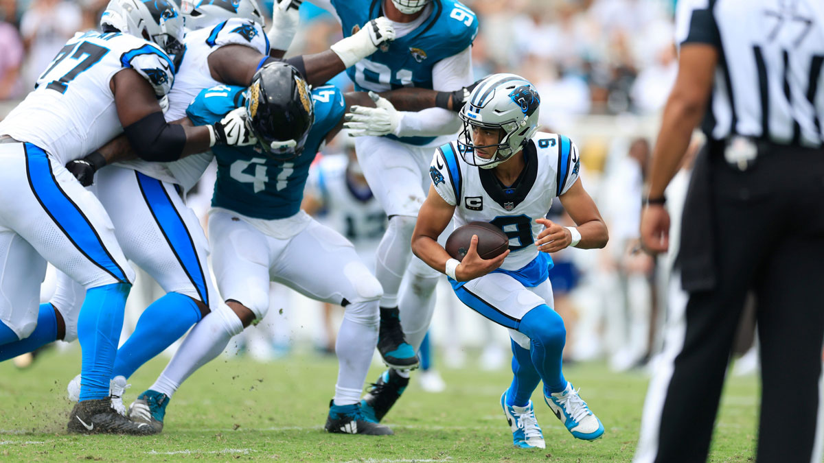 Carolina Panthers quarterback Bryce Young (9) is flushed from the pocket during the second quarter of an NFL football matchup at EverBank Stadium, Sunday, Sept. 7, 2025 in Jacksonville, Fla.
