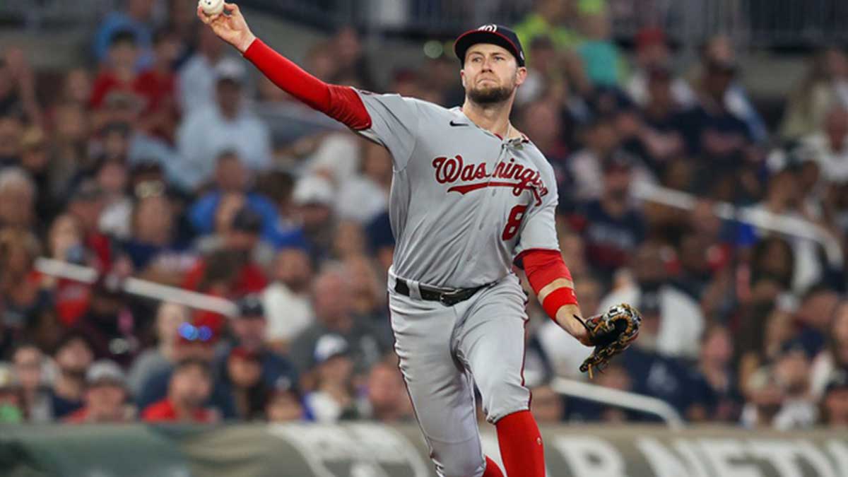 Washington Nationals third baseman Carter Kieboom (8) throws a runner out at first against the Atlanta Braves in the fifth inning at Truist Park.