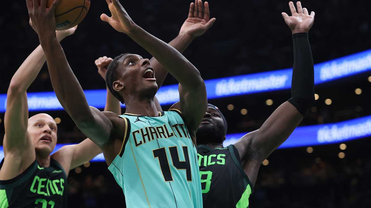 Charlotte Hornets forward Moussa Diabate (14) shoots during the second half against the Boston Celtics at TD Garden.