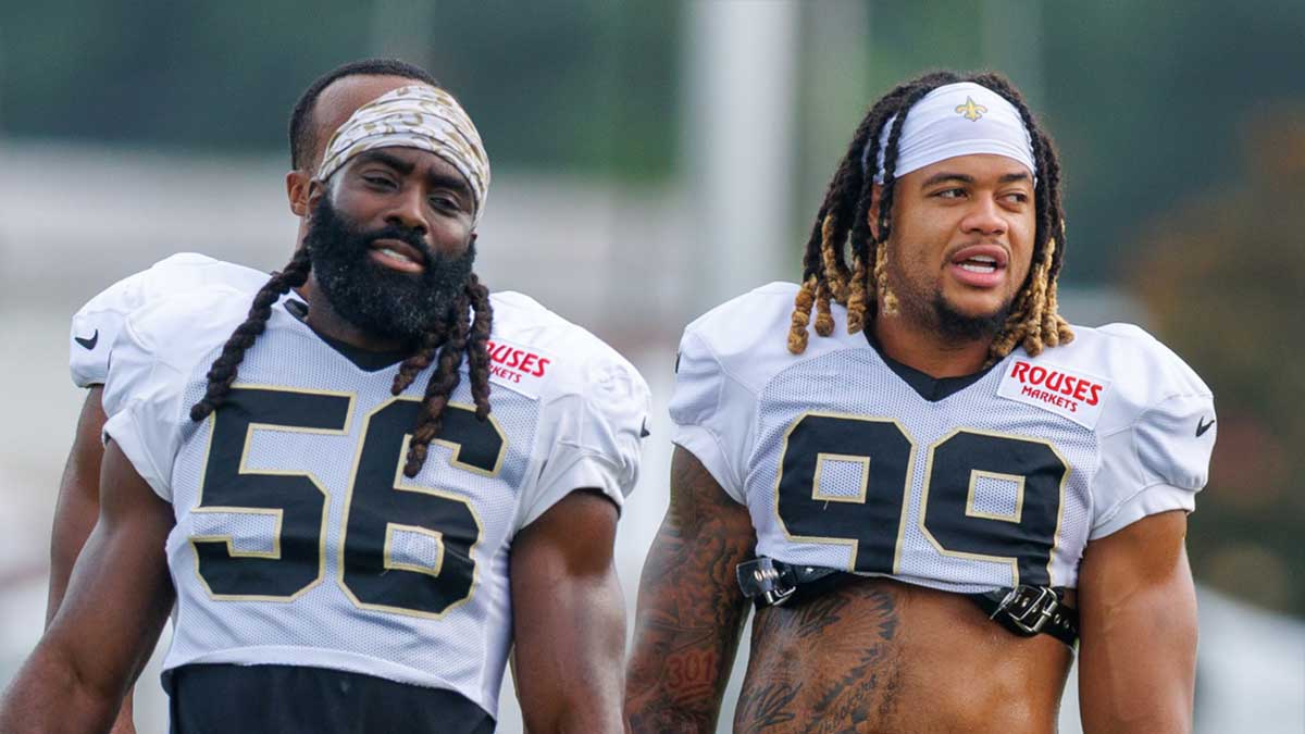 New Orleans Saints linebacker Demario Davis (56) and defensive end Chase Young (99) during training camp at Ochsner Sports Performance Center.
