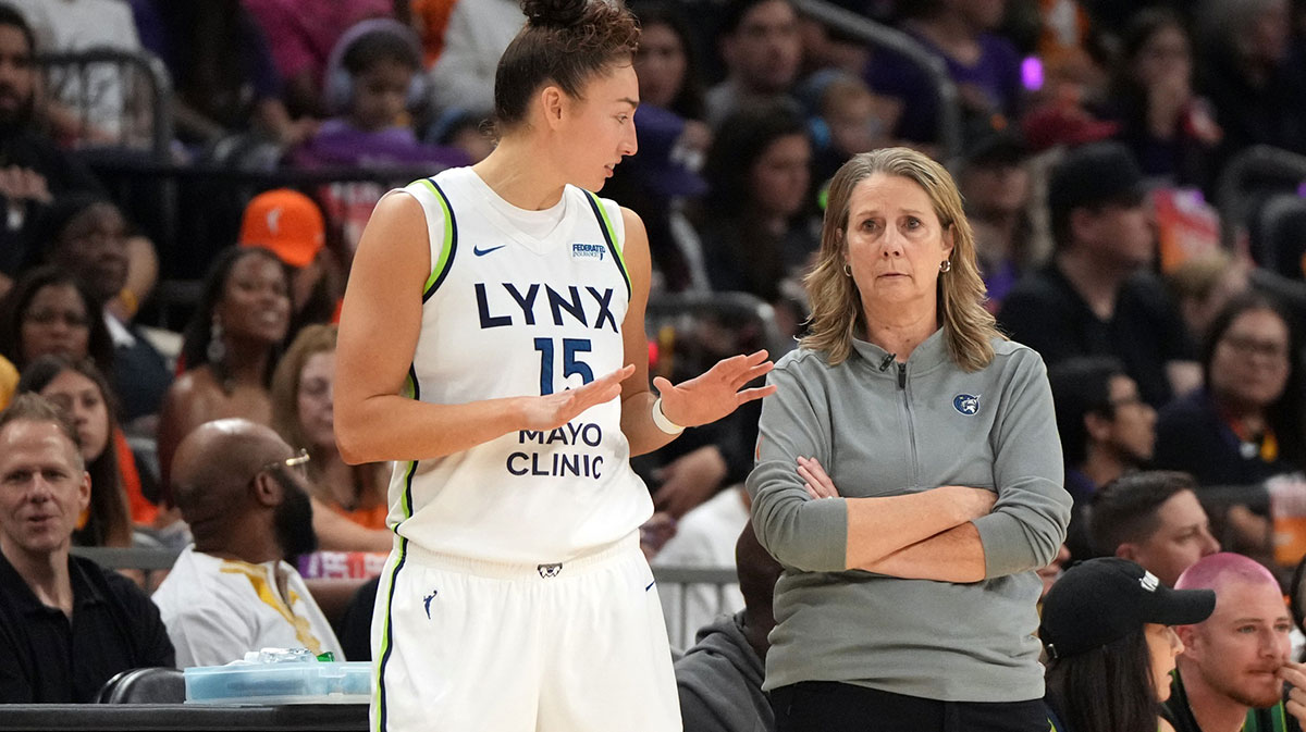 Minnesota Lynx forward Jessica Shepard (15) talks to head coach Cheryl Reeve during game three against the Phoenix Mercury of the second round for the 2025 WNBA Playoffs at PHX Arena.