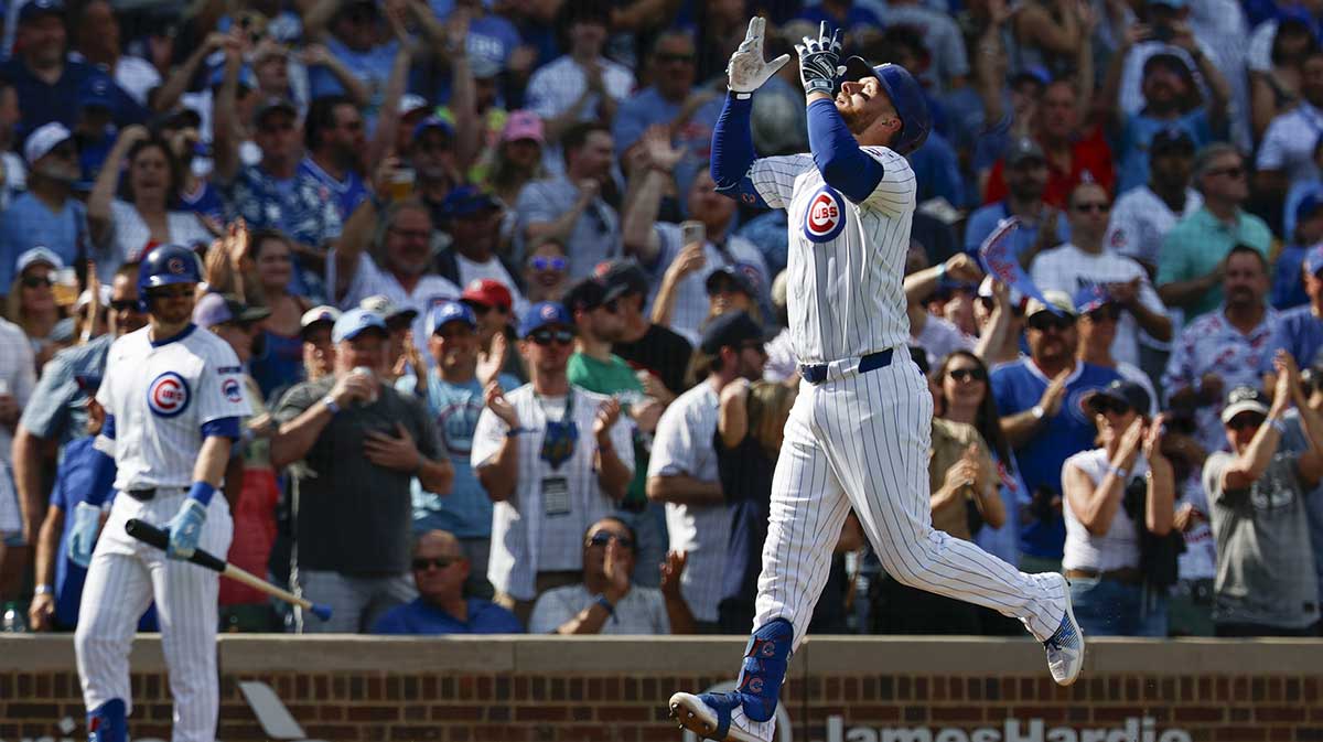 Chicago Cubs first baseman Michael Busch (29) rounds the bases after hitting a two-run home run against the St. Louis Cardinals during the fifth inning at Wrigley Field.