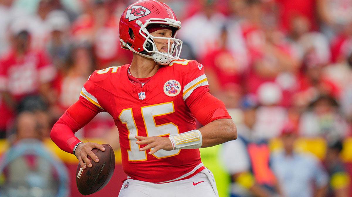 Kansas City Chiefs quarterback Patrick Mahomes (15) passes the ball against the Philadelphia Eagles during the fourth quarter of the game at GEHA Field at Arrowhead Stadium.