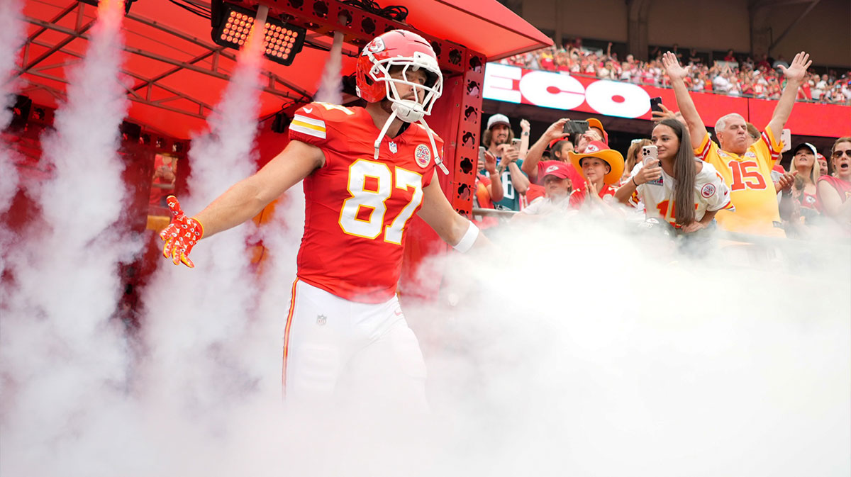 Kansas City Chiefs tight end Travis Kelce (87) runs onto the field prior to the game against the Philadelphia Eagles at GEHA Field at Arrowhead Stadium.