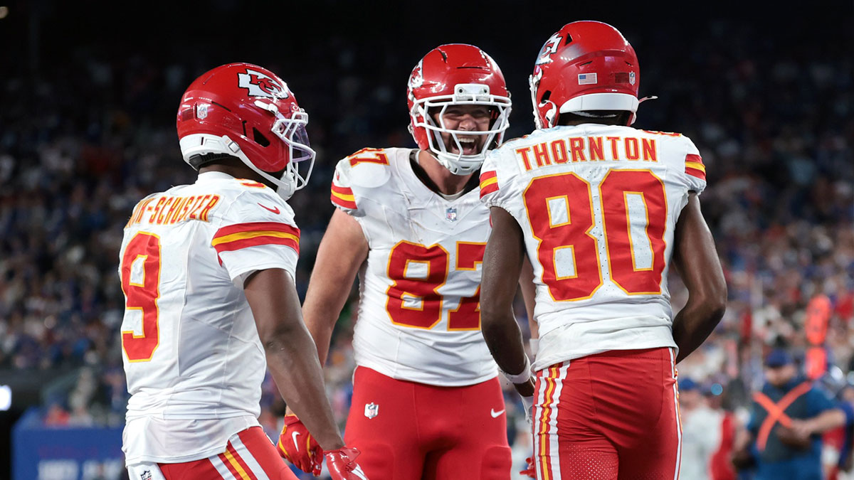 Kansas City Chiefs wide receiver Tyquan Thornton (80) celebrates with tight end Travis Kelce (87) and wide receiver Juju Smith-Schuster (9) after a reception against the New York Giants in the fourth quarter at MetLife Stadium
