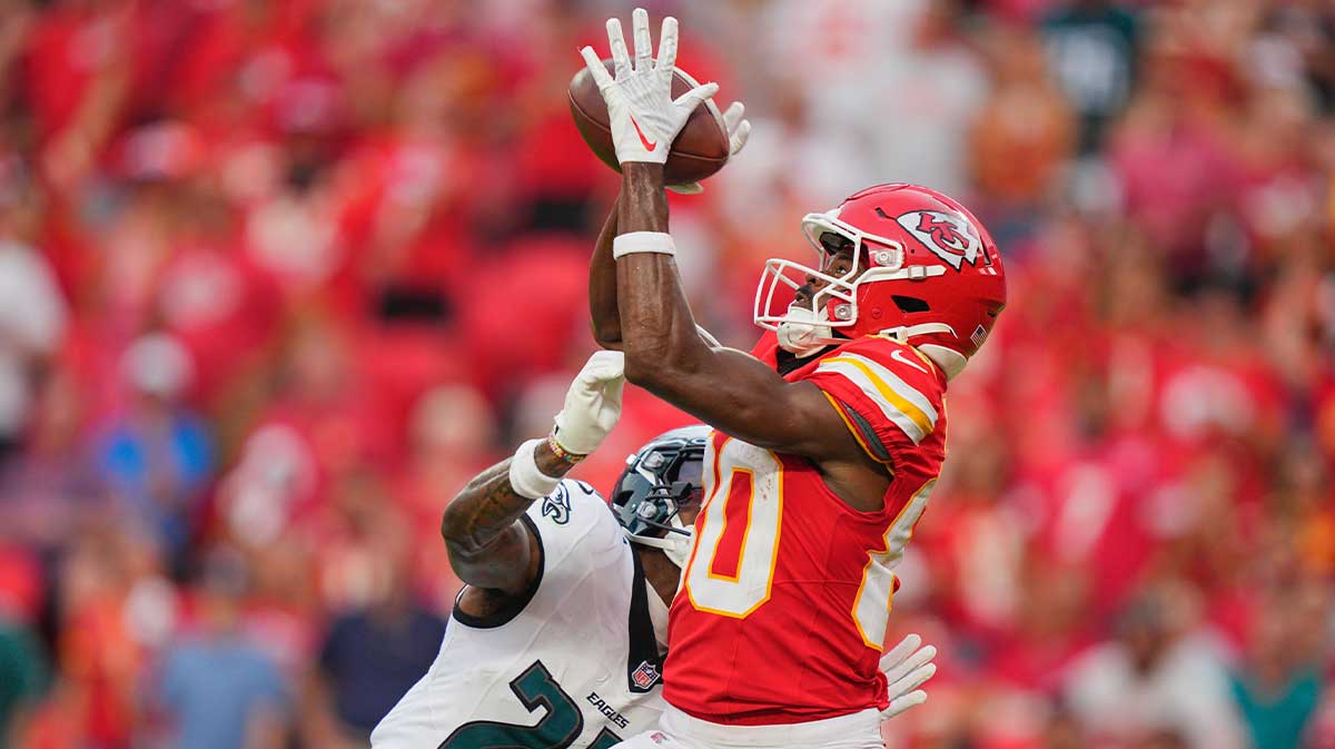 Kansas City Chiefs wide receiver Tyquan Thornton (80) makes a reception for a touchdown defended by Philadelphia Eagles cornerback Quinyon Mitchell (27) during the fourth quarter of the game at GEHA Field at Arrowhead Stadium.