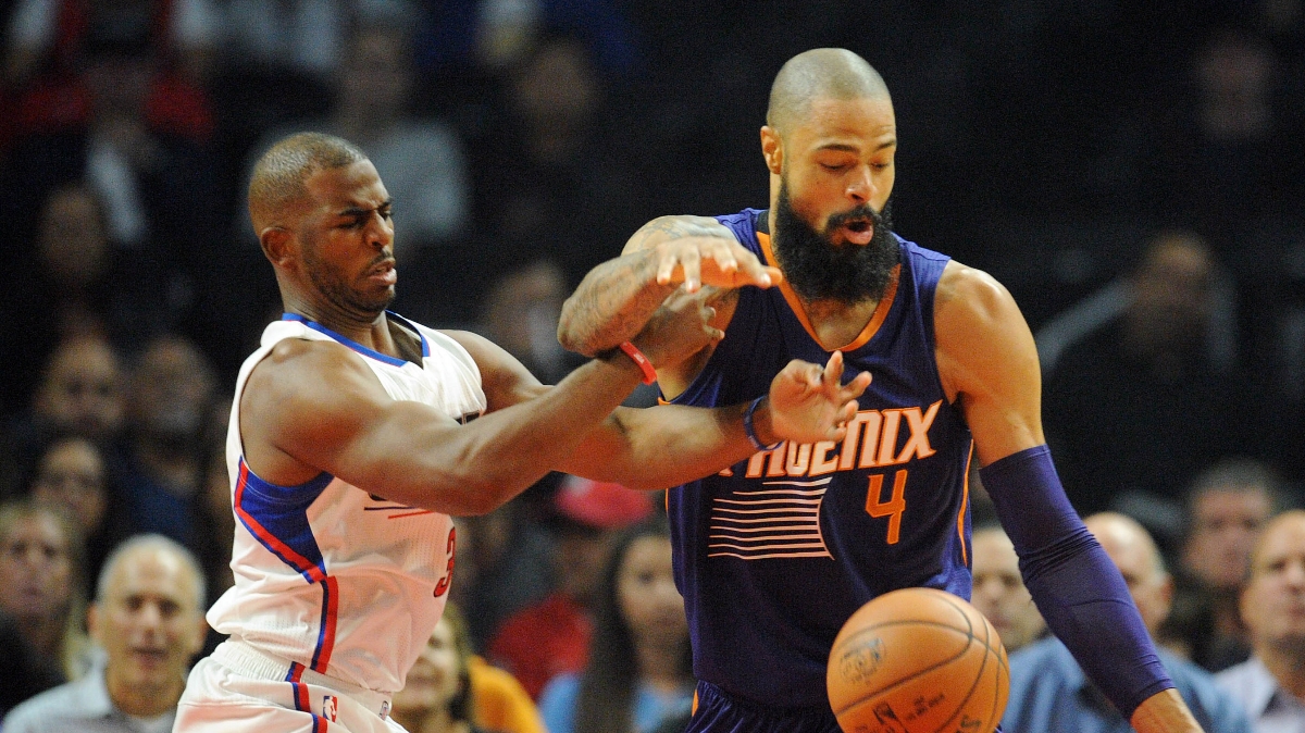 Phoenix Suns center Tyson Chandler (4) plays for the ball against Los Angeles Clippers guard Chris Paul (3) during the first half at Staples Center.