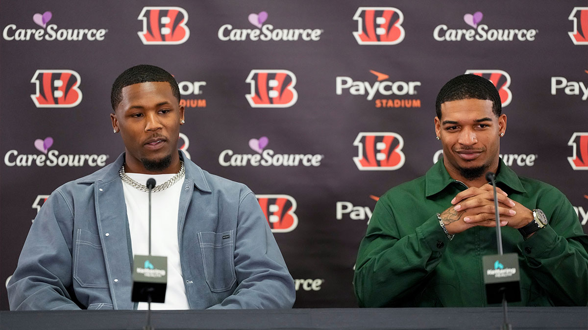 Cincinnati Bengals receivers Tee Higgins (left) and Ja’marr Chase take the stage during a press conference