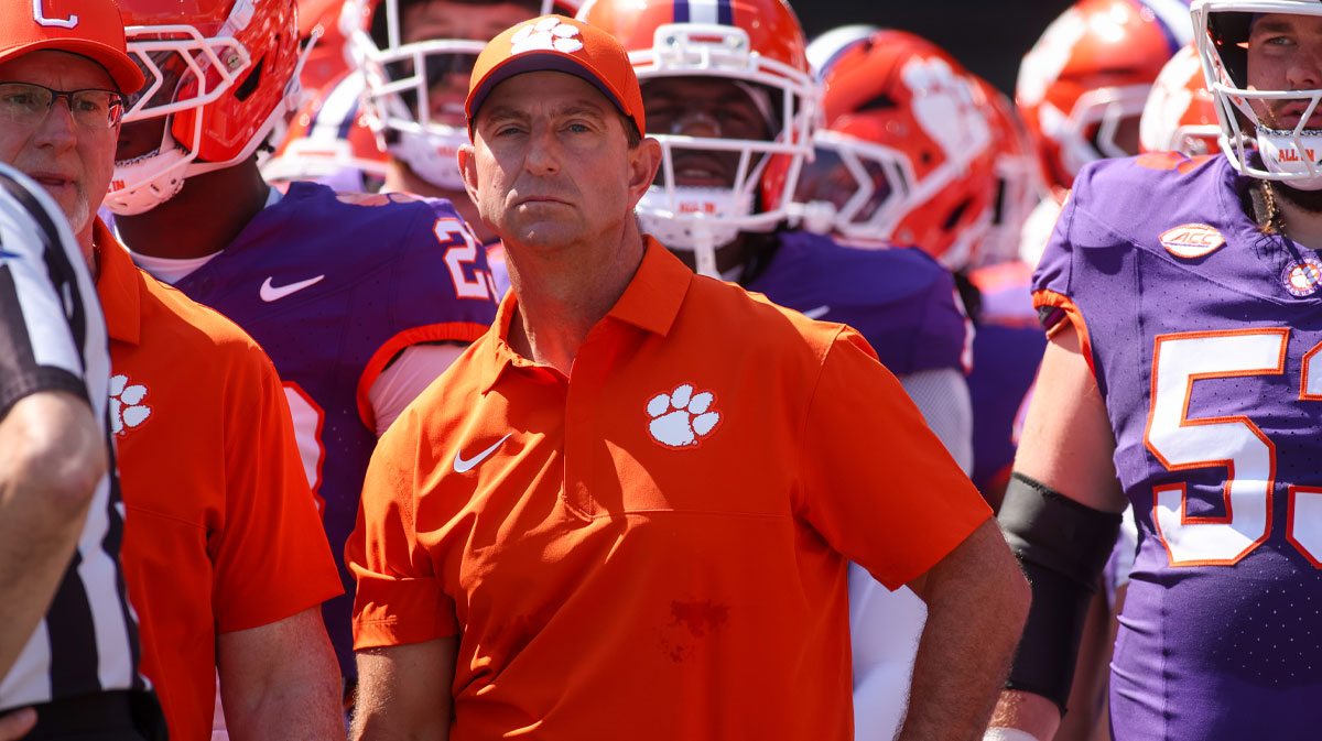 Clemson Tigers head coach Dabo Swinney prepares to run on the field with his team before a game against the Georgia Tech Yellow Jackets at Bobby Dodd Stadium at Hyundai Field.