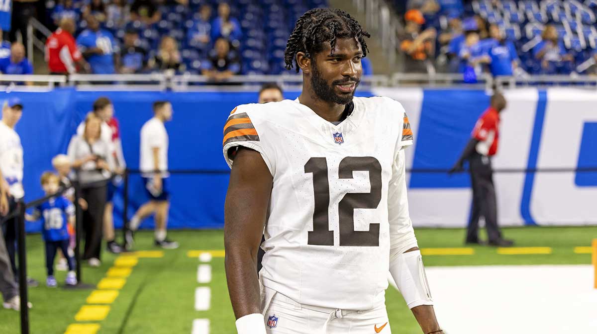 Cleveland Browns quarterback Shedeur Sanders (12) warms up before the game against the Detroit Lions at Ford Field.