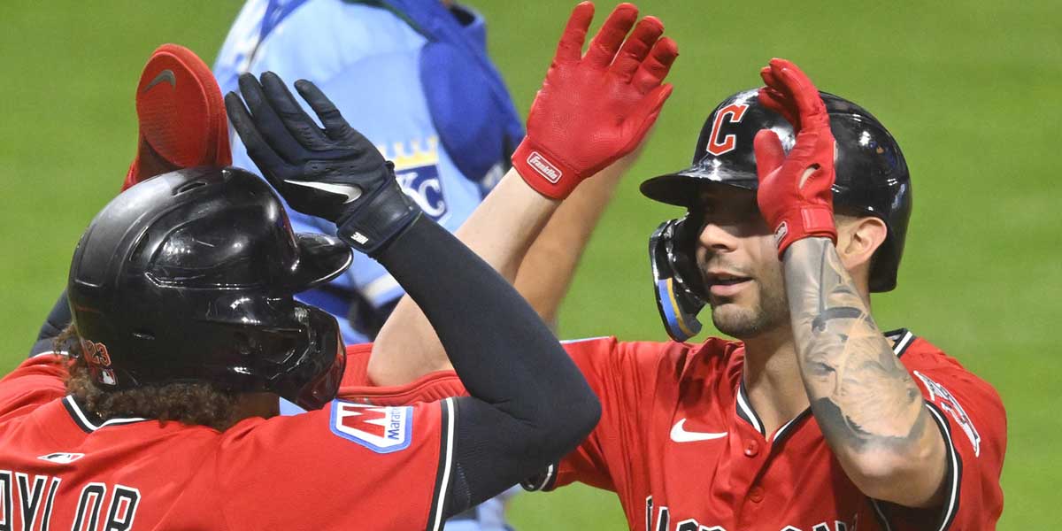 Cleveland Guardians right fielder CJ Kayfus (63) celebrates his two-run home run with catcher Bo Naylor (23) in the eighth inning against the Kansas City Royals at Progressive Field.