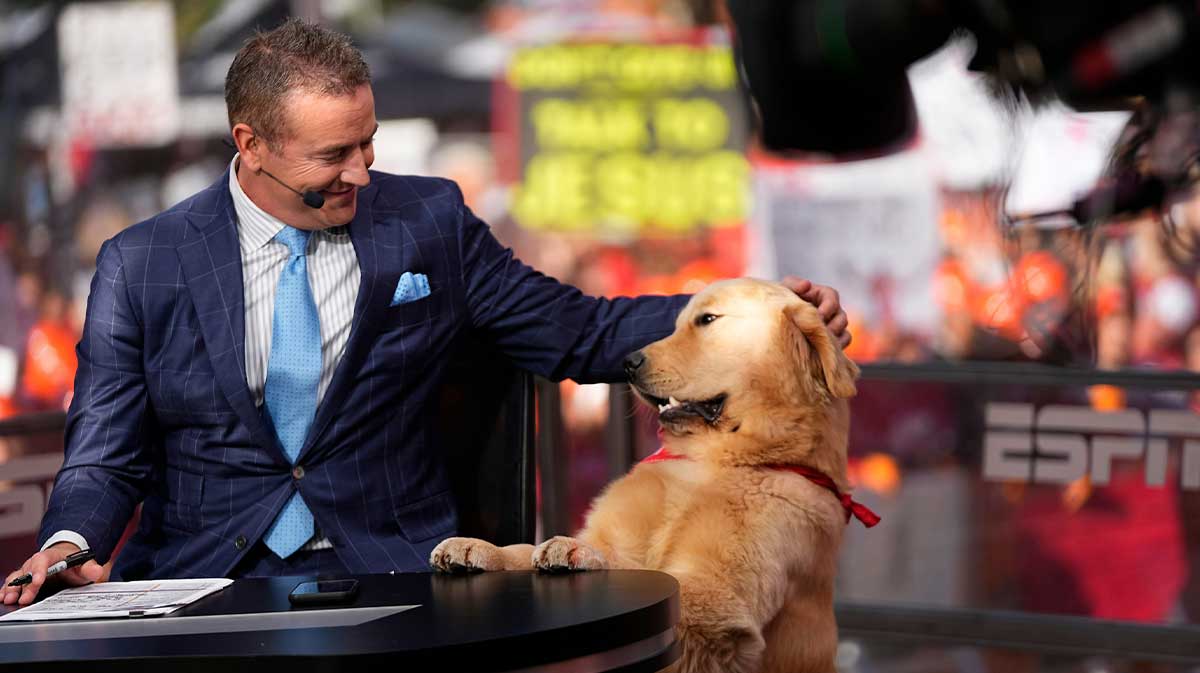 Kirk Herbstreit pets his dog, Peter, on the set of ESPN College GameDay prior to the NCAA football game between the Ohio State Buckeyes and the Texas Longhorns at Ohio Stadium on Aug. 30, 2025.