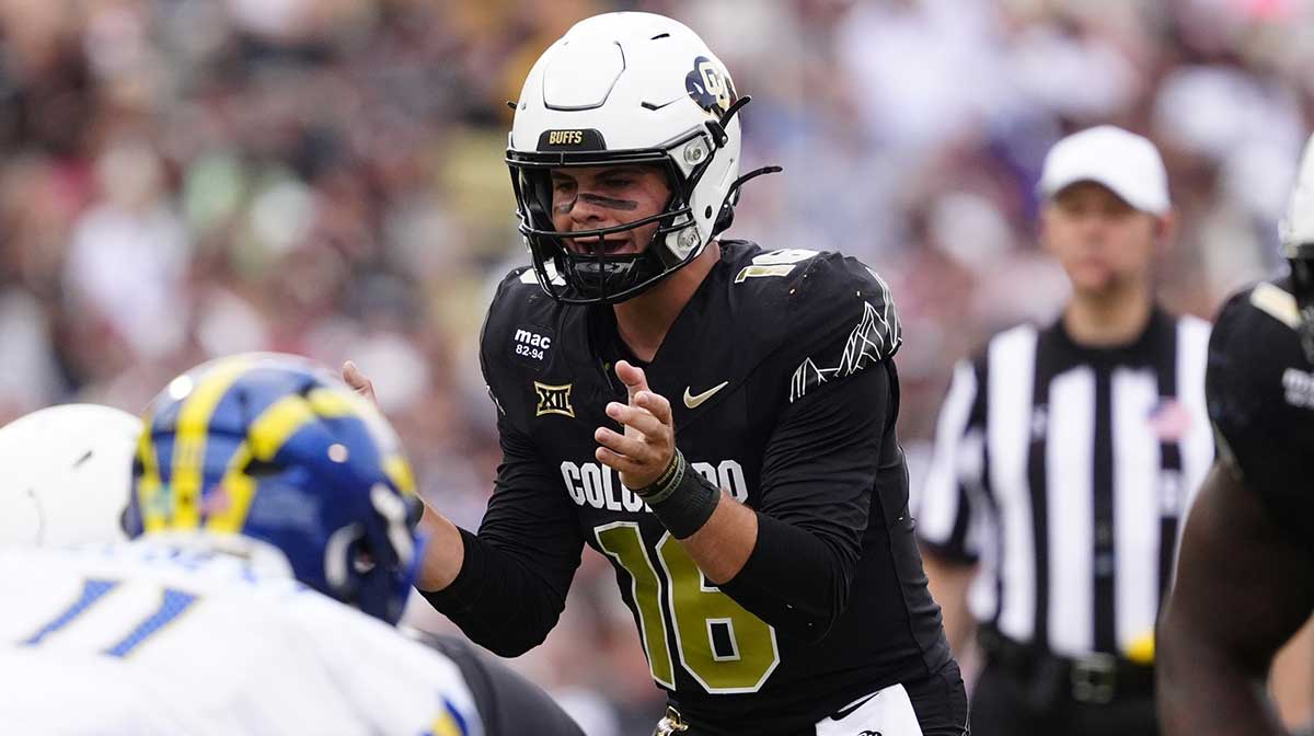 Colorado Buffaloes quarterback Ryan Staub (16) calls for the ball in the second half against the Delaware Fightin Blue Hens at Folsom Field.